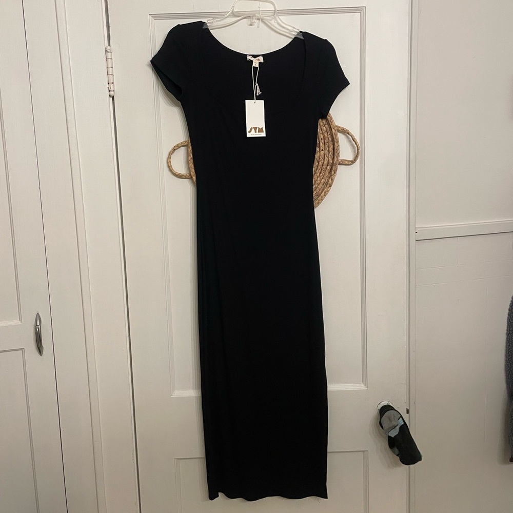 SYM Black Ribbed form fitting dress. New with tags!